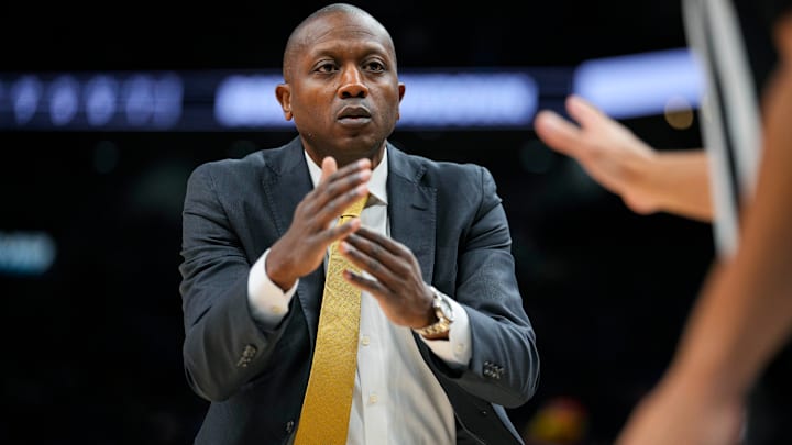 Dec 7, 2025; Kansas City, Missouri, USA; Missouri Tigers head coach Dennis Gates calls for a timeout during the first half against the Kansas Jayhawks at T-Mobile Center.
