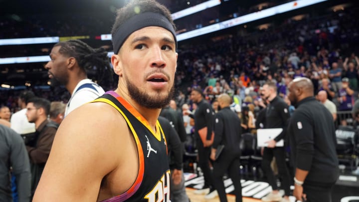 Apr 28, 2024; Phoenix, Arizona, USA; Phoenix Suns guard Devin Booker (1) leaves the court after game four of the first round for the 2024 NBA playoffs against the Minnesota Timberwolves at Footprint Center. Mandatory Credit: Joe Camporeale-USA TODAY Sports