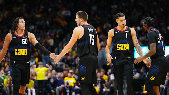 Nov 3, 2023; Denver, Colorado, USA; Denver Nuggets forward Aaron Gordon (50), center Nikola Jokic (15), forward Michael Porter Jr. (1) and guard Kentavious Caldwell-Pope (5) celebrate a score in the second half against the Dallas Mavericks at Ball Arena. Mandatory Credit: Ron Chenoy-Imagn Images Nov 3, 2023; Denver, Colorado, USA; Denver Nuggets forward Aaron Gordon (50), center Nikola Jokic (15), forward Michael Porter Jr. (1) and guard Kentavious Caldwell-Pope (5) celebrate a score in the second half against the Dallas Mavericks at Ball Arena. Mandatory Credit: Ron Chenoy-Imagn Images