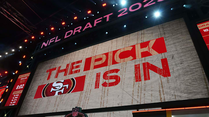 Apr 24, 2025; Green Bay, WI, USA; The San Francisco 49ers logo is projected on the video board during the NFL Draft at Lambeau Field. Mandatory Credit: Kirby Lee-Imagn Images Apr 24, 2025; Green Bay, WI, USA; The San Francisco 49ers logo is projected on the video board during the NFL Draft at Lambeau Field. Mandatory Credit: Kirby Lee-Imagn Images
