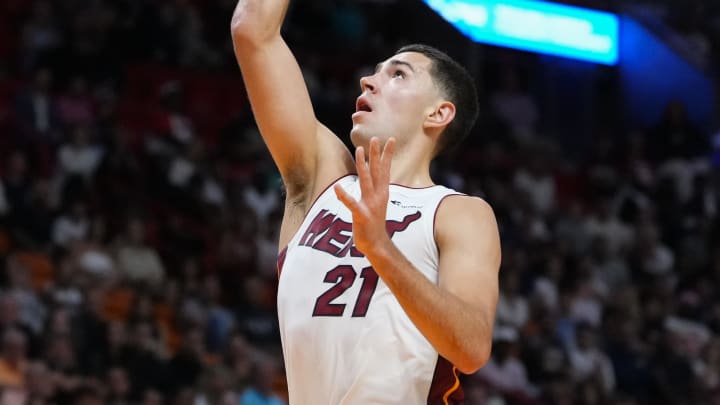 Oct 18, 2023; Miami, Florida, USA; Miami Heat forward Cole Swider (21) shoots against the Brooklyn Nets during the second half at Kaseya Center. Mandatory Credit: Rich Storry-USA TODAY Sports