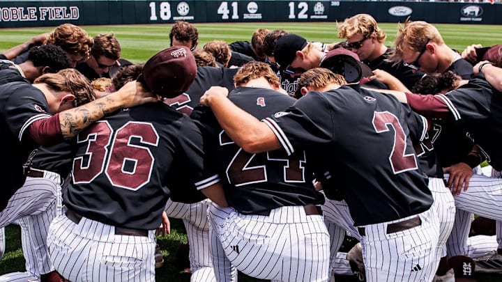 Mississippi State players huddle before a game against LSU at Dudy Noble Field in Starkville.
