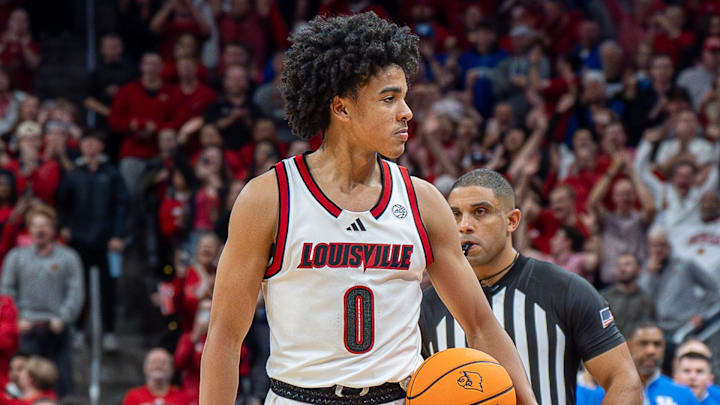 Louisville Cardinals guard Mikel Brown Jr. (0) looked to the crowd as time expired as the Louisville Cardinals hosted the Kentucky Wildcats at the KFC Yum! Center on Tuesday, Nov. 11, 2025. The Cardinals defeated the Wildcats 96-88. Louisville Cardinals guard Mikel Brown Jr. (0) looked to the crowd as time expired as the Louisville Cardinals hosted the Kentucky Wildcats at the KFC Yum! Center on Tuesday, Nov. 11, 2025. The Cardinals defeated the Wildcats 96-88.