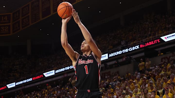 Feb 16, 2026; Ames, Iowa, USA; Houston Cougars guard Isiah Harwell (1) shoots against the Iowa State Cyclones during the second half at James H. Hilton Coliseum.