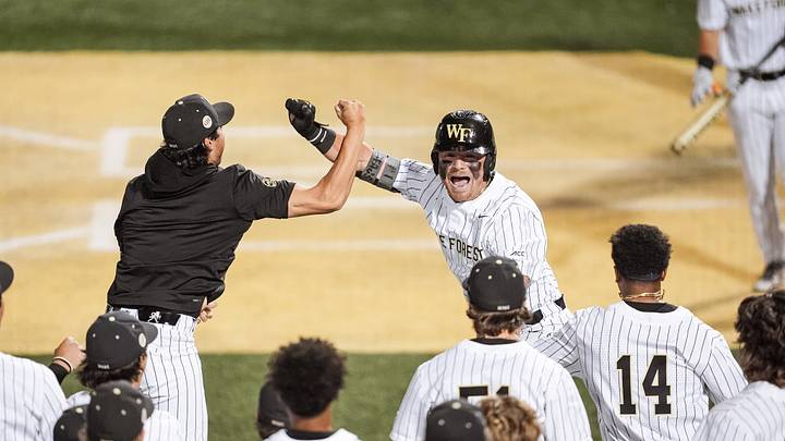 Members of the Wake Forest baseball team celebrate after the win at home on April 14 against Coastal Carolina. 