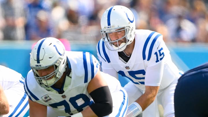 Oct 13, 2024; Nashville, Tennessee, USA;  Indianapolis Colts quarterback Joe Flacco (15) under center against the Tennessee Titans during the first half at Nissan Stadium. 