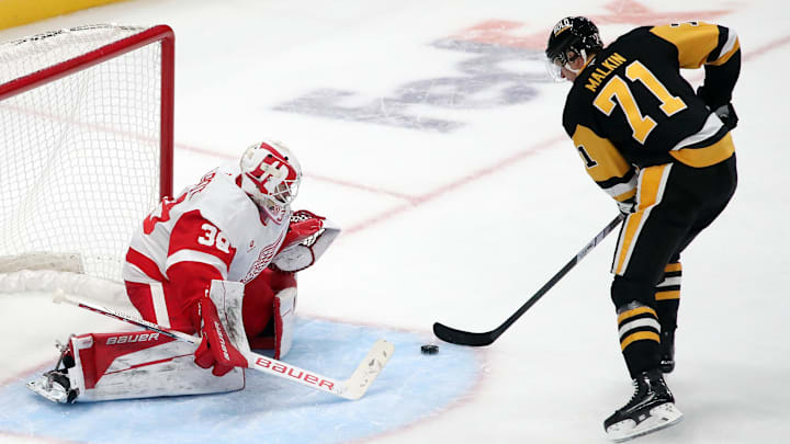 Nov 13, 2024; Pittsburgh, Pennsylvania, USA; Detroit Red Wings goaltender Cam Talbot (39) defends the net against Pittsburgh Penguins center Evgeni Malkin (71) in overtime at PPG Paints Arena. Mandatory Credit: Charles LeClaire-Imagn Images Nov 13, 2024; Pittsburgh, Pennsylvania, USA; Detroit Red Wings goaltender Cam Talbot (39) defends the net against Pittsburgh Penguins center Evgeni Malkin (71) in overtime at PPG Paints Arena. Mandatory Credit: Charles LeClaire-Imagn Images