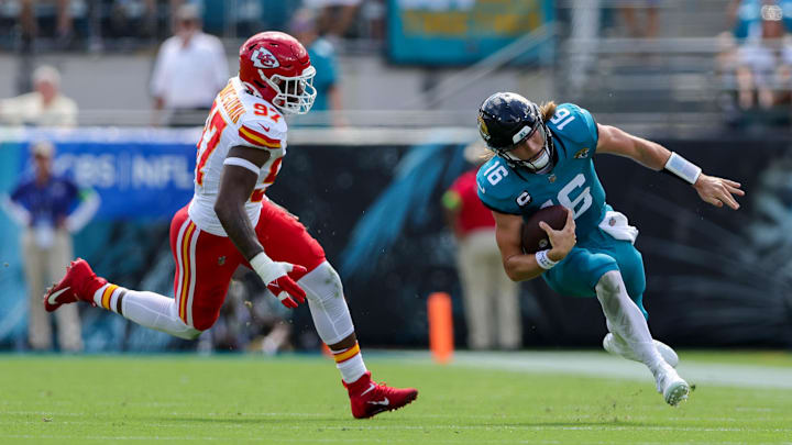Sep 17, 2023; Jacksonville, Florida, USA;  Rookie defensive end Felix Anudike-Uzomah (97) chases down Jacksonville Jaguars quarterback Trevor Lawrence (16).