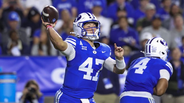 Oct 3, 2025; Provo, Utah, USA; Brigham Young Cougars quarterback Bear Bachmeier (47) throws the ball against the West Virginia Mountaineers during the second quarter at LaVell Edwards Stadium. Mandatory Credit: Rob Gray-Imagn Images
