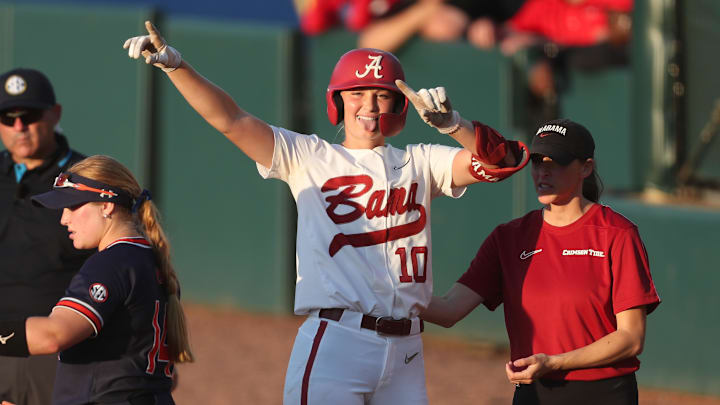 May 6, 2025; Athens, GA, USA; Alabama infielder Abby Duchscherer (10) reacts to a hit during a game against Auburn at Jack Turner Softball Stadium.