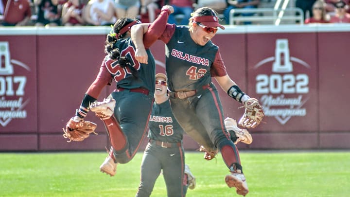 Gabbie Garcia and Ailana Agbayani celebrate turning a double play for the Sooners. Gabbie Garcia and Ailana Agbayani celebrate turning a double play for the Sooners.