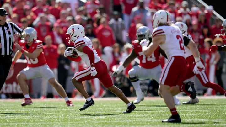 Nebraska Cornhuskers defensive back Malcolm Hartzog Jr. (7) returns an interception against Ohio State Buckeyes during the third quarter of their game at Ohio Stadium on Oct 26, 2024, in Columbus. Nebraska Cornhuskers defensive back Malcolm Hartzog Jr. (7) returns an interception against Ohio State Buckeyes during the third quarter of their game at Ohio Stadium on Oct 26, 2024, in Columbus.