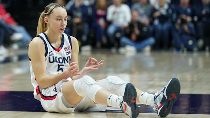 Jan 22, 2025; Storrs, Connecticut, USA; UConn Huskies guard Paige Bueckers (5) reacts after her three point basket and being fouled by the Villanova Wildcats in the first half at Harry A. Gampel Pavilion. Mandatory Credit: David Butler II-Imagn Images