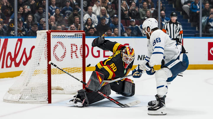 Jan 31, 2026; Vancouver, British Columbia, CAN; Toronto Maple Leafs forward William Nylander (88) scores on Vancouver Canucks goalie Nikita Tolopilo (60) during the shootout at Rogers Arena. Mandatory Credit: Bob Frid-Imagn Images