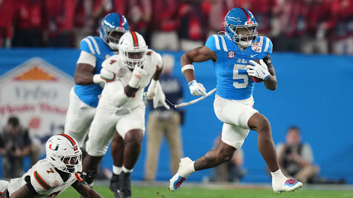 Ole Miss Rebels running back Kewan Lacy (5) scores on a 73-yard touchdown run against the Miami Hurricanes during their Vrbo Fiesta Bowl matchup at State Farm Stadium on Jan. 8, 2026. Ole Miss Rebels running back Kewan Lacy (5) scores on a 73-yard touchdown run against the Miami Hurricanes during their Vrbo Fiesta Bowl matchup at State Farm Stadium on Jan. 8, 2026.