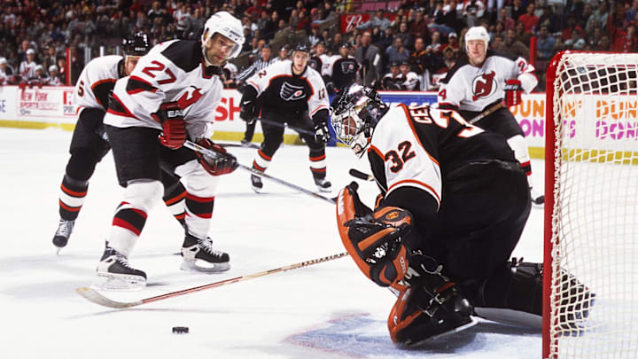 Unknown Date, 2001; East Rutherford, NJ, USA; FILE PHOTO; New Jersey Devils defensemen Scott Niedermayer (27) and Turner Stevenson (24) in action against Philadelphia Flyers goalie Roman Cechmanek (32), Kim Johnsson (5) and Simon Gagne (12) at Continental Airlines Arena.