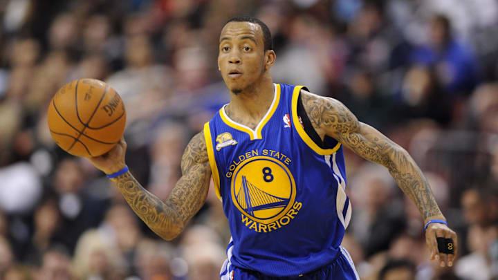 Mar 02, 2012; Philadelphia, PA, USA; Golden State Warriors guard Monta Ellis (8) passes the ball during the second quarter against the Philadelphia 76ers at the Wells Fargo Center. Mandatory Credit: Howard Smith-Imagn Images