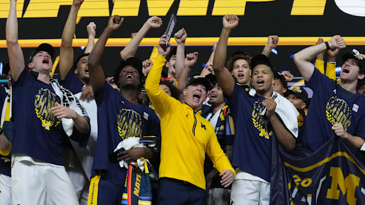 The Michigan Wolverines celebrate their NCAA men's basketball tournament national championship victory Monday, April 6, 2026, after defeating the UConn Huskies 69-63 at Lucas Oil Stadium in Indianapolis.