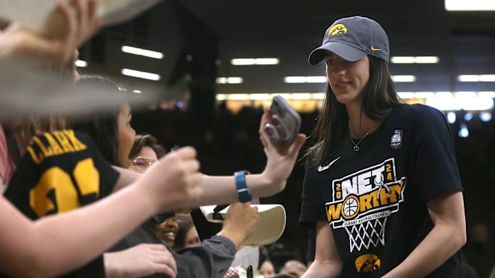 Iowa’s Caitlin Clark signs autographs after a celebration of the Iowa women’s basketball team Wednesday, April 10, 2024 at Carver-Hawkeye Arena in Iowa City, Iowa. Iowa’s Caitlin Clark signs autographs after a celebration of the Iowa women’s basketball team Wednesday, April 10, 2024 at Carver-Hawkeye Arena in Iowa City, Iowa.