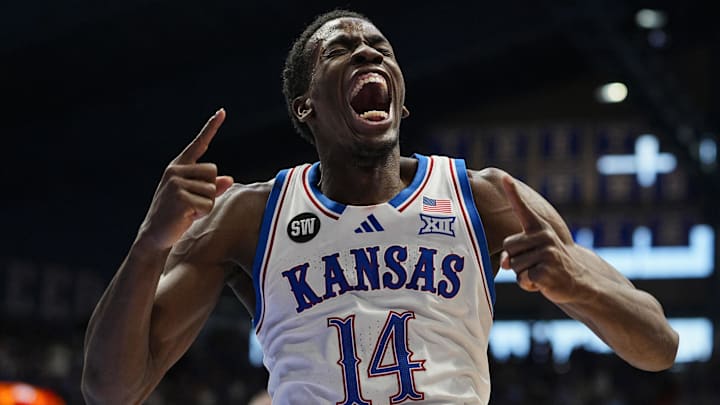 Feb 7, 2026; Lawrence, Kansas, USA; Kansas Jayhawks guard Melvin Council Jr. (14) celebrates during the second half against the Kansas Jayhawks at Allen Fieldhouse. Mandatory Credit: Jay Biggerstaff-Imagn Images