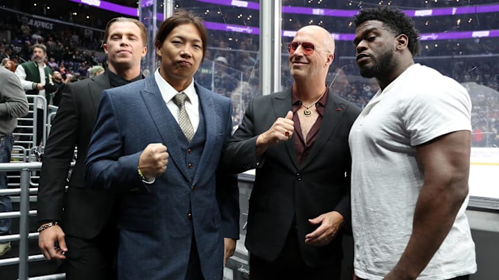Nov 16, 2023; Los Angeles, California, USA; AEW professional wrestlers, Kyle Fletcher (left), Konosuke Takeshita, Don Callis, and Powerhouse Hobbs (right) attend the NHL game between the Los Angeles Kings and the Florida Panthers at Crypto.com Arena. Mandatory Credit: Kiyoshi Mio-Imagn Images