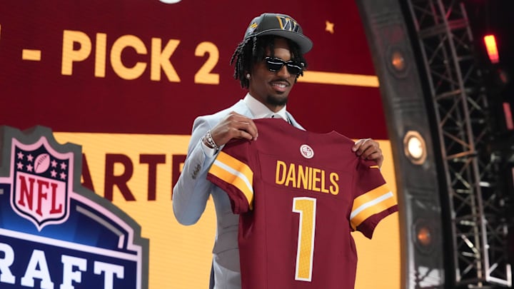 Apr 25, 2024; Detroit, MI, USA; LSU Tigers quarterback Jayden Daniels poses after being selected by