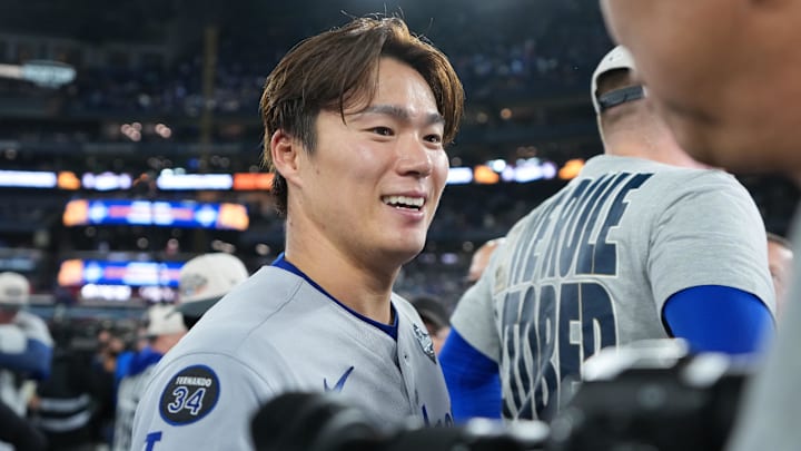 Nov 1, 2025; Toronto, Ontario, CAN; Los Angeles Dodgers pitcher Yoshinobu Yamamoto (18) reacts after defeating the Toronto Blue Jays in the eleventh inning for game seven of the 2025 MLB World Series at Rogers Centre. Mandatory Credit: Nick Turchiaro-Imagn Images Nov 1, 2025; Toronto, Ontario, CAN; Los Angeles Dodgers pitcher Yoshinobu Yamamoto (18) reacts after defeating the Toronto Blue Jays in the eleventh inning for game seven of the 2025 MLB World Series at Rogers Centre. Mandatory Credit: Nick Turchiaro-Imagn Images