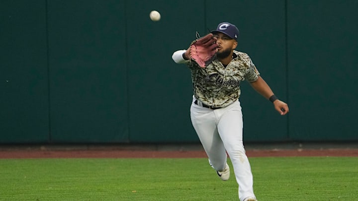 Jun 28, 2023; Columbus, Ohio, USA;  Columbus Clippers right fielder George Valera (13) catches a ball during the MiLB baseball game against the Toledo Mud Hens at Huntington Park. Mandatory Credit: Adam Cairns-The Columbus Dispatch