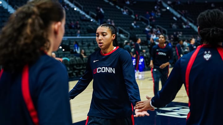 Nov 16, 2025; Hartford, Connecticut, USA; UConn Huskies guard Azzi Fudd (35) and teammates warm up before the start of the game against the Ohio State Buckeyes at Peoples Bank Arena. Mandatory Credit: David Butler II-Imagn Images