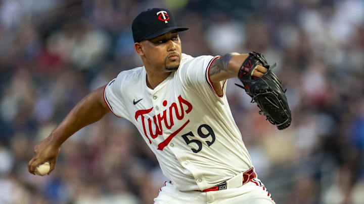 Jul 9, 2025; Minneapolis, Minnesota, USA; Minnesota Twins relief pitcher Jhoan Duran (59) delivers a pitch against the Chicago Cubs in the ninth inning at Target Field