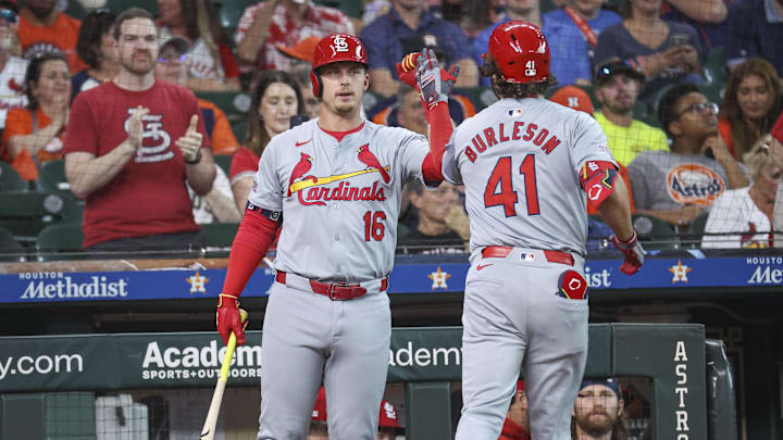Jun 3, 2024; Houston, Texas, USA; St. Louis Cardinals right fielder Alec Burleson (41) celebrates with second baseman Nolan Gorman (16) after hitting a home run during the first inning against the Houston Astros at Minute Maid Park. Mandatory Credit: Troy Taormina-Imagn Images