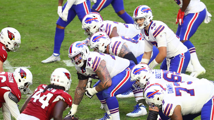 Nov 15, 2020; Glendale, Arizona, USA; Buffalo Bills center Jon Feliciano (76) prepares to snap the ball to quarterback Josh Allen (17) against the Arizona Cardinals at State Farm Stadium. Mandatory Credit: Mark J. Rebilas-Imagn Images