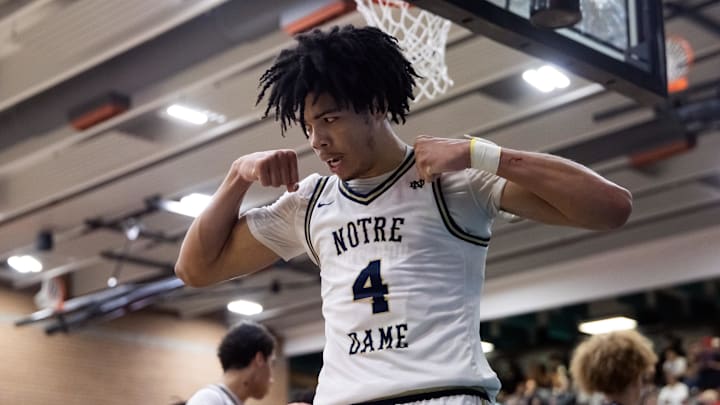 Jan 4, 2025; Gilbert, AZ, USA; Notre Dame High School (CA) forward Tyran Stokes (4) flexes as he celebrates a shot against Sandra Day O'Connor (AZ) during the Hoophall West High School Invitational at Highland High School.
