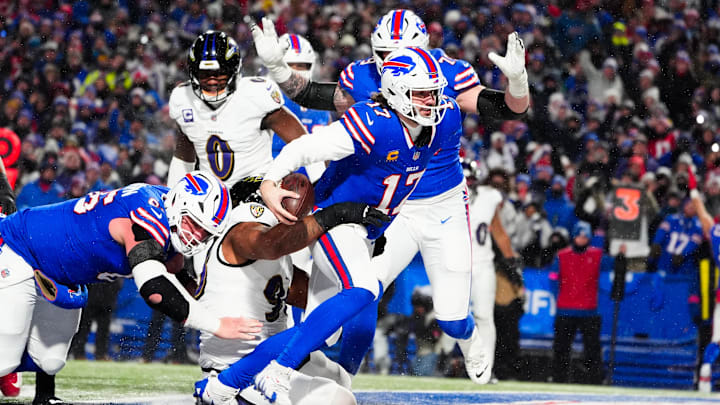 Bills quarterback Josh Allen (17) rushes for a touchdown against the Ravens in 2025.
