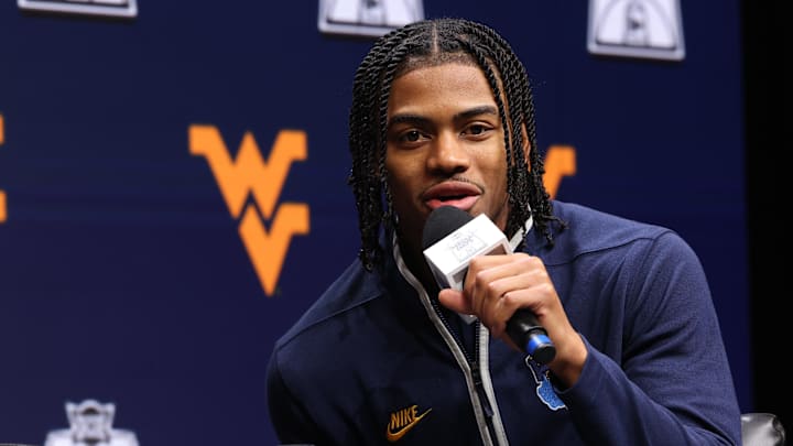 Oct 22, 2025; Kansas City, MO, USA; West Virginias Jasper Floyd speaks to media during Big 12 Menís Basketball media day at T-Mobile Center. Mandatory Credit: Sophia Scheller-Imagn Images Oct 22, 2025; Kansas City, MO, USA; West Virginias Jasper Floyd speaks to media during Big 12 Menís Basketball media day at T-Mobile Center. Mandatory Credit: Sophia Scheller-Imagn Images