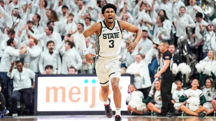 Michigan State guard Jaden Akins celebrates a 3-point basket against Michigan during the first half at Breslin Center in East Lansing on Sunday, March 9, 2025. Michigan State guard Jaden Akins celebrates a 3-point basket against Michigan during the first half at Breslin Center in East Lansing on Sunday, March 9, 2025.