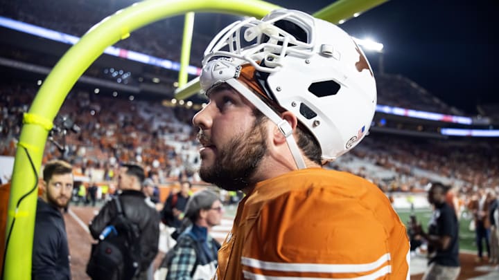 Dec 21, 2024; Austin, Texas, USA; Texas Longhorns offensive lineman Jake Majors (65) against the Clemson Tigers during the CFP National playoff first round at Darrell K Royal-Texas Memorial Stadium. Mandatory Credit: Mark J. Rebilas-Imagn Images Dec 21, 2024; Austin, Texas, USA; Texas Longhorns offensive lineman Jake Majors (65) against the Clemson Tigers during the CFP National playoff first round at Darrell K Royal-Texas Memorial Stadium. Mandatory Credit: Mark J. Rebilas-Imagn Images