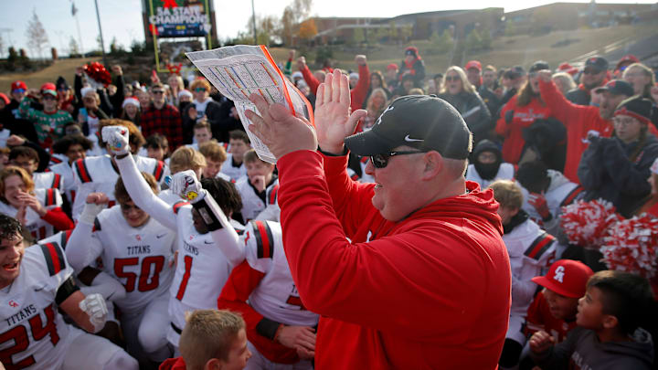 Carl Albert coach Mike Dunn celebrates with his team after the Class 5A state football championship game between the Carl Albert Titans and the McAlester Buffaloes at Chad Richison Stadium in Edmond Saturday, Dec. 3, 2022. Carl Albert coach Mike Dunn celebrates with his team after the Class 5A state football championship game between the Carl Albert Titans and the McAlester Buffaloes at Chad Richison Stadium in Edmond Saturday, Dec. 3, 2022.
