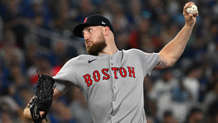 Sep 24, 2025; Toronto, Ontario, CAN;  Boston Red Sox starting pitcher Garrett Crochet (35) delivers a pitch against the Toronto Blue Jays in the fourth inning at Rogers Centre. Mandatory Credit: Dan Hamilton-Imagn Images