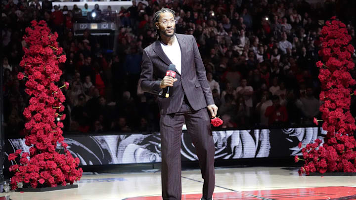 Jan 4, 2025; Chicago, Illinois, USA; Chicago Bulls and New York Knicks former player Derrick Rose speaks as he is honored at halftime of a game between the Chicago Bulls and the New York Knicks at United Center. Mandatory Credit: David Banks-Imagn Images