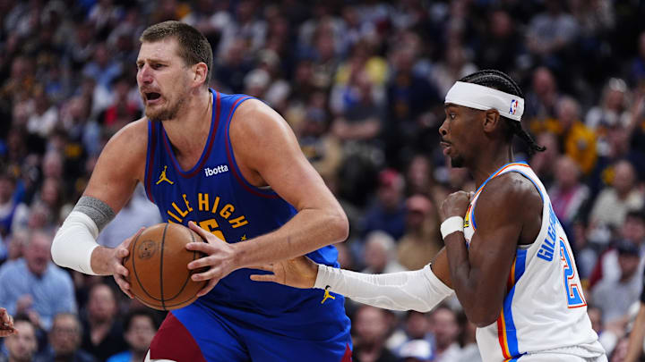 May 9, 2025; Denver, Colorado, USA; Oklahoma City Thunder guard Shai Gilgeous-Alexander (2) defends on Denver Nuggets center Nikola Jokic (15) in the second half during game three of the second round for the 2025 NBA Playoffs at Ball Arena. Mandatory Credit: Ron Chenoy-Imagn Images May 9, 2025; Denver, Colorado, USA; Oklahoma City Thunder guard Shai Gilgeous-Alexander (2) defends on Denver Nuggets center Nikola Jokic (15) in the second half during game three of the second round for the 2025 NBA Playoffs at Ball Arena. Mandatory Credit: Ron Chenoy-Imagn Images