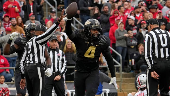 Purdue Boilermakers linebacker Kydran Jenkins (4) picks up a fumble by Ohio State Buckeyes 