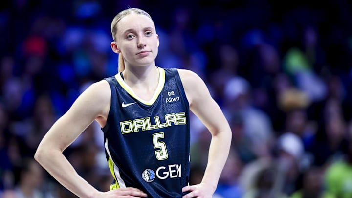 May 16, 2025; Arlington, Texas, USA;  Dallas Wings guard Paige Bueckers (5) reacts against the Minnesota Lynx during the first half at College Park Center. Mandatory Credit: Kevin Jairaj-Imagn Images