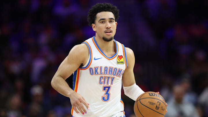 Mar 23, 2026; Philadelphia, Pennsylvania, USA; Oklahoma City Thunder guard Jared McCain (3) dribbles the ball against the Philadelphia 76ers during the fourth quarter at Xfinity Mobile Arena. Mandatory Credit: Bill Streicher-Imagn Images