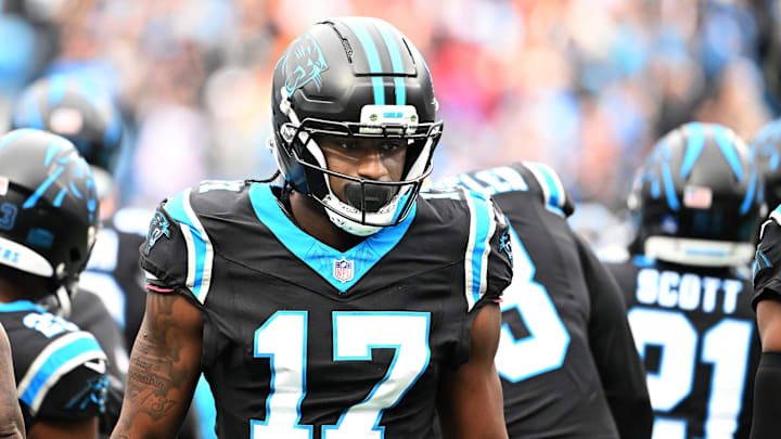Dec 21, 2025; Charlotte, North Carolina, USA; Carolina Panthers wide receiver Xavier Legette (17) runs on to the field before the game at Bank of America Stadium. Mandatory Credit: Bob Donnan-Imagn Images