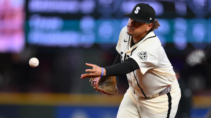Mar 29, 2026: Seattle Mariners first baseman Josh Naylor (12) tosses the ball to first base for a force out on Cleveland Guardians left center Steven Kwan (38) (not pictured) during the first inning at T-Mobile Park. Mar 29, 2026: Seattle Mariners first baseman Josh Naylor (12) tosses the ball to first base for a force out on Cleveland Guardians left center Steven Kwan (38) (not pictured) during the first inning at T-Mobile Park.