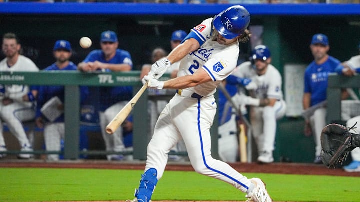 Sep 17, 2025; Kansas City, Missouri, USA; Kansas City Royals second baseman Adam Frazier (26) hits a two run home run against the Seattle Mariners during the eighth inning at Kauffman Stadium. Mandatory Credit: Denny Medley/Imagn Images