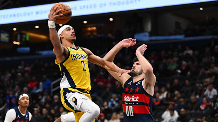 Feb 19, 2026; Washington, District of Columbia, USA; Indiana Pacers guard Andrew Nembhard (2) shoots as Washington Wizards forward Tristan Vukcevic (00) defends during the second half at Capital One Arena. Mandatory Credit: Brad Mills-Imagn Images