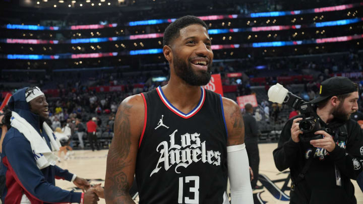 Dec 6, 2023; Los Angeles, California, USA; LA Clippers forward Paul George (13) reacts after the game against the Denver Nuggets at Crypto.com Arena. Mandatory Credit: Kirby Lee-USA TODAY Sports