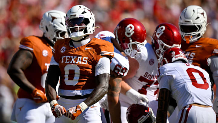 Texas Longhorns linebacker Anthony Hill Jr. (0) celebrates after a defensive stop against the Oklahoma Sooners during the first half at the Cotton Bowl.